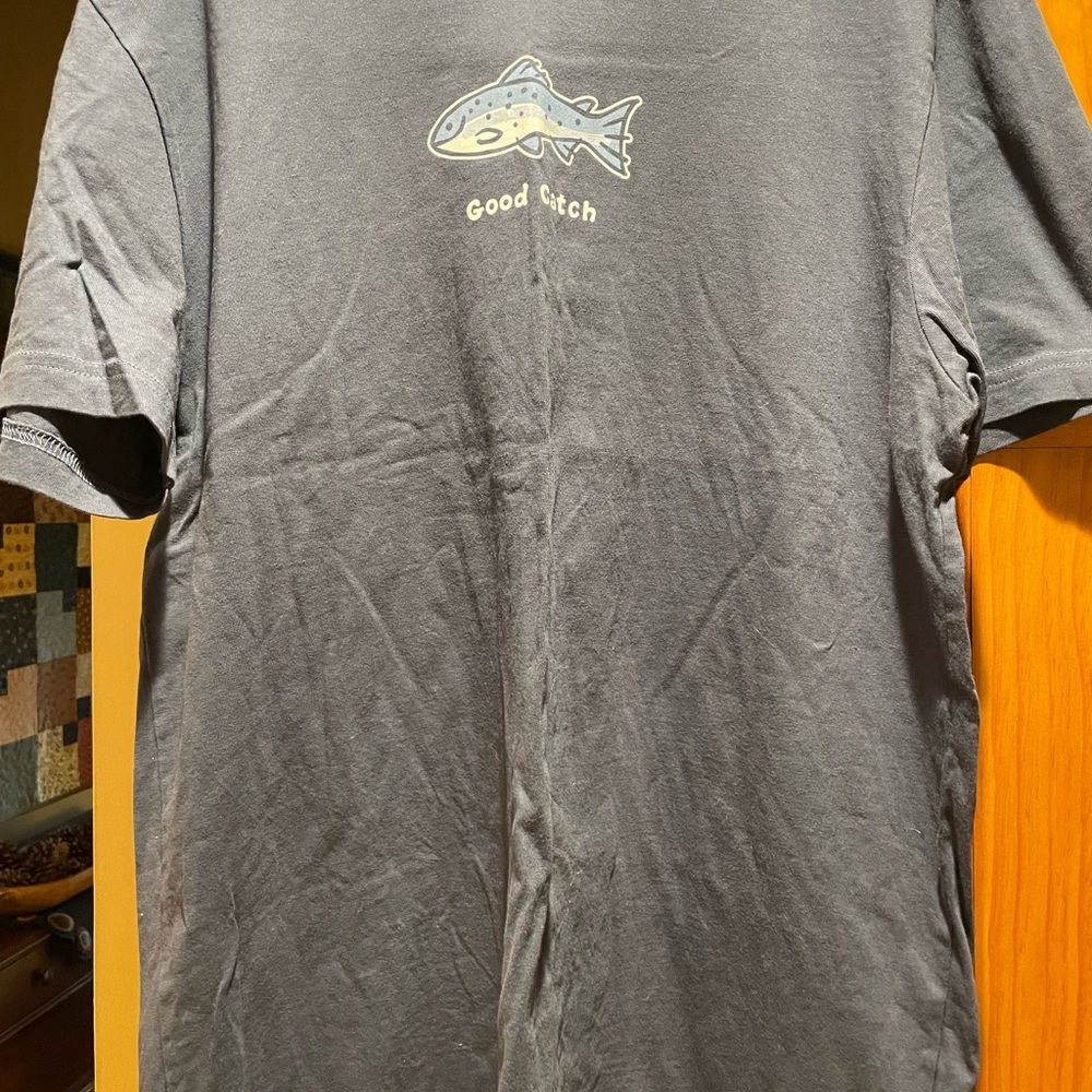 Mens size large. Navy blue. Life is Good tshirt. Says “good catch”
